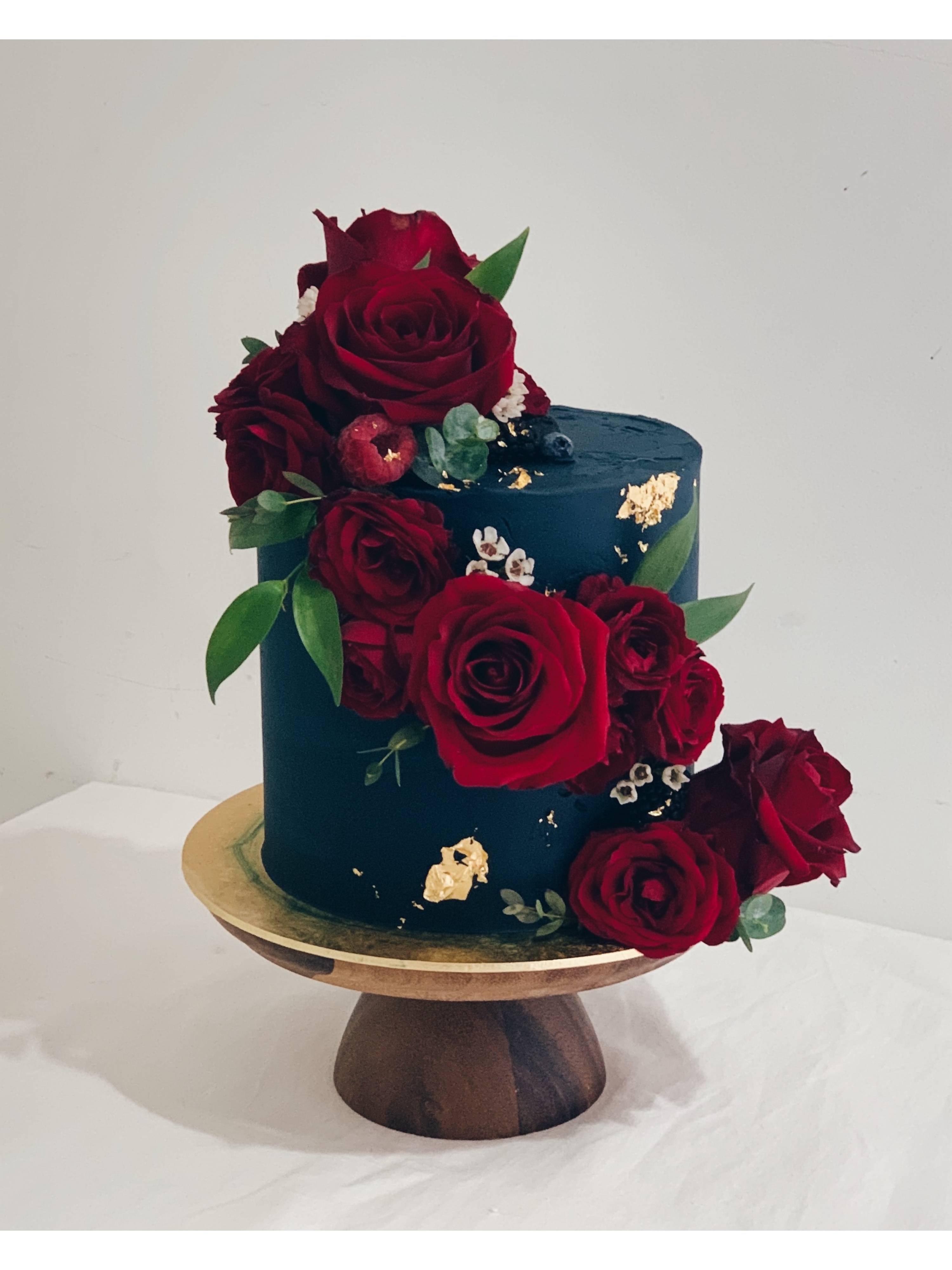 F23. Navy Cascading Maroon Floral Cake