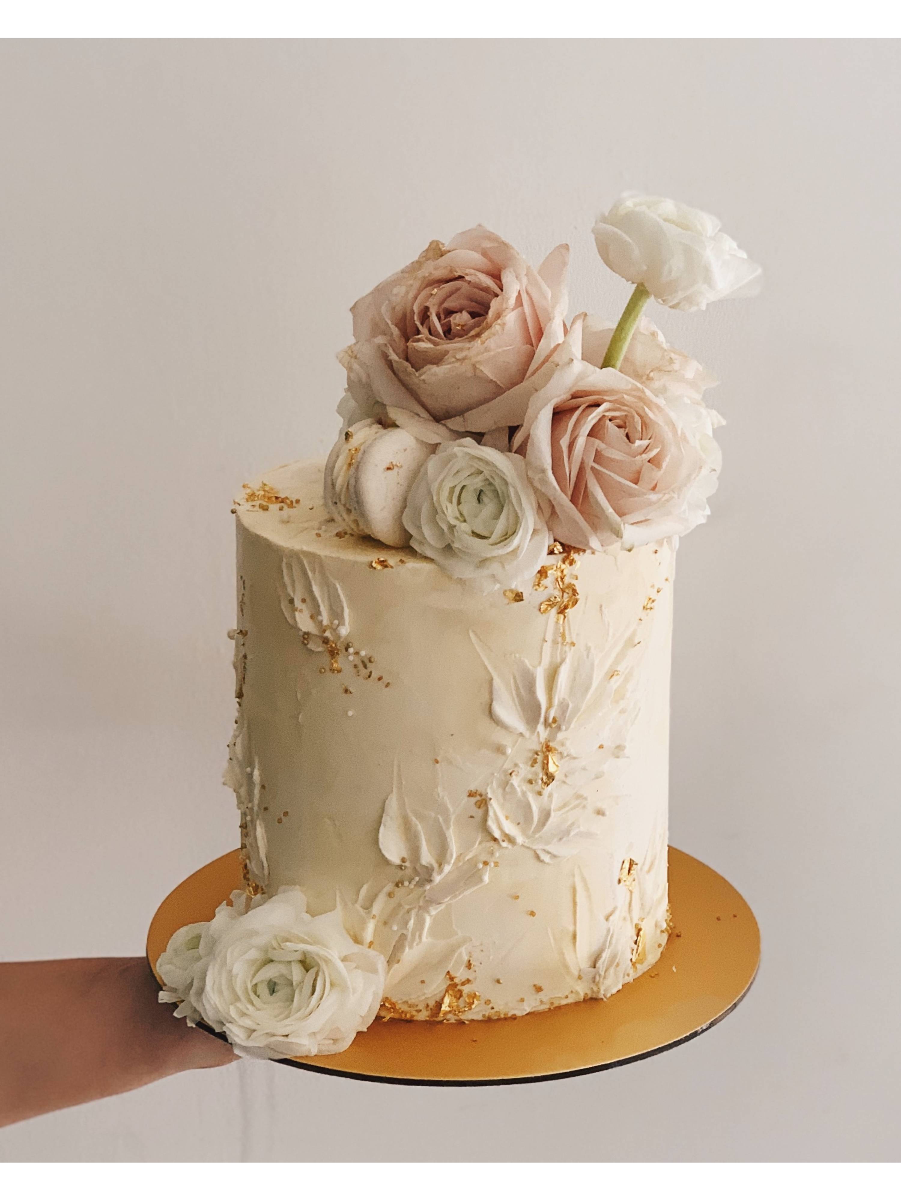 F26. Abstract White Nude Floral Cake