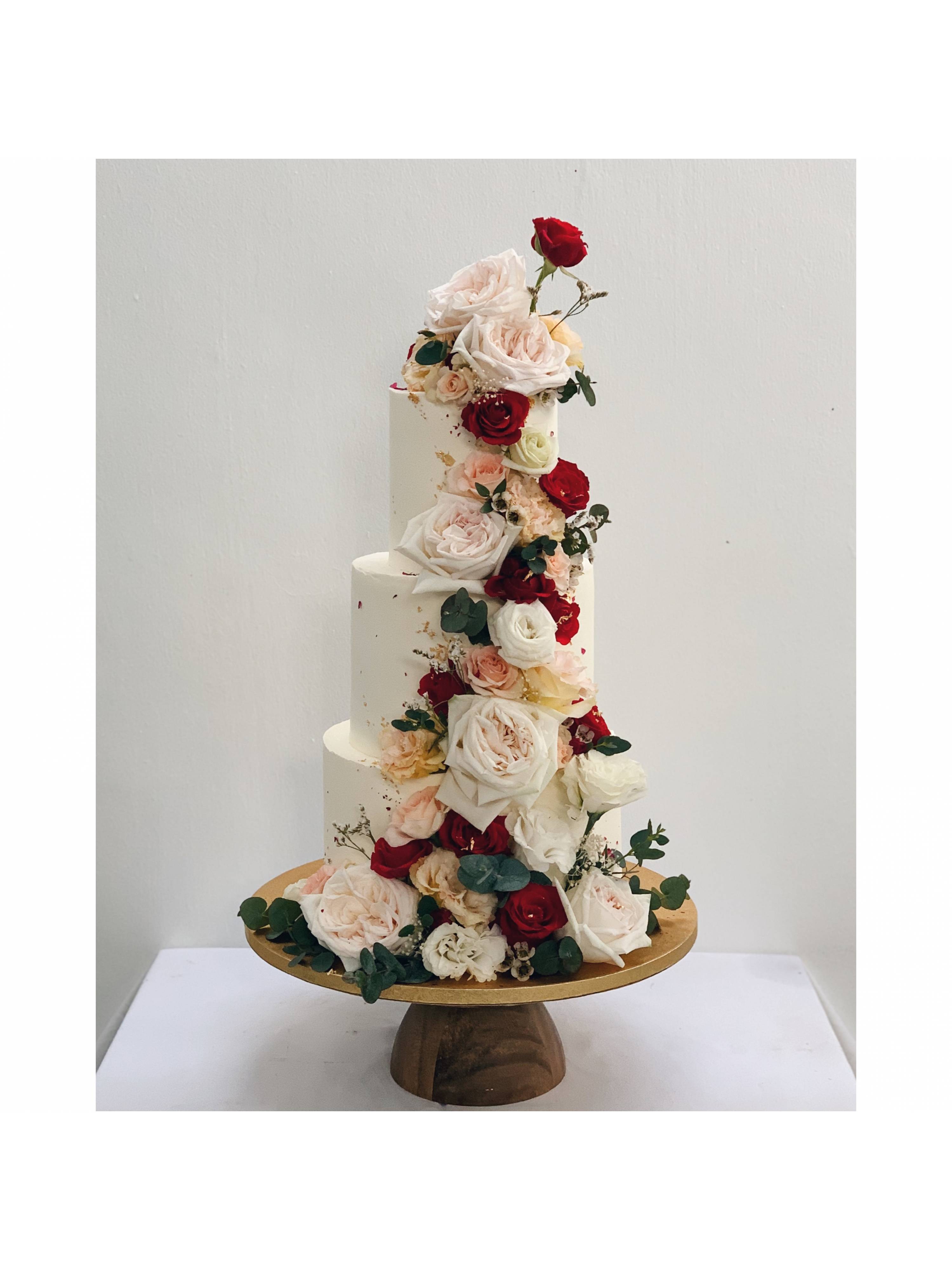 Cascading White Blush Maroon Floral Cake