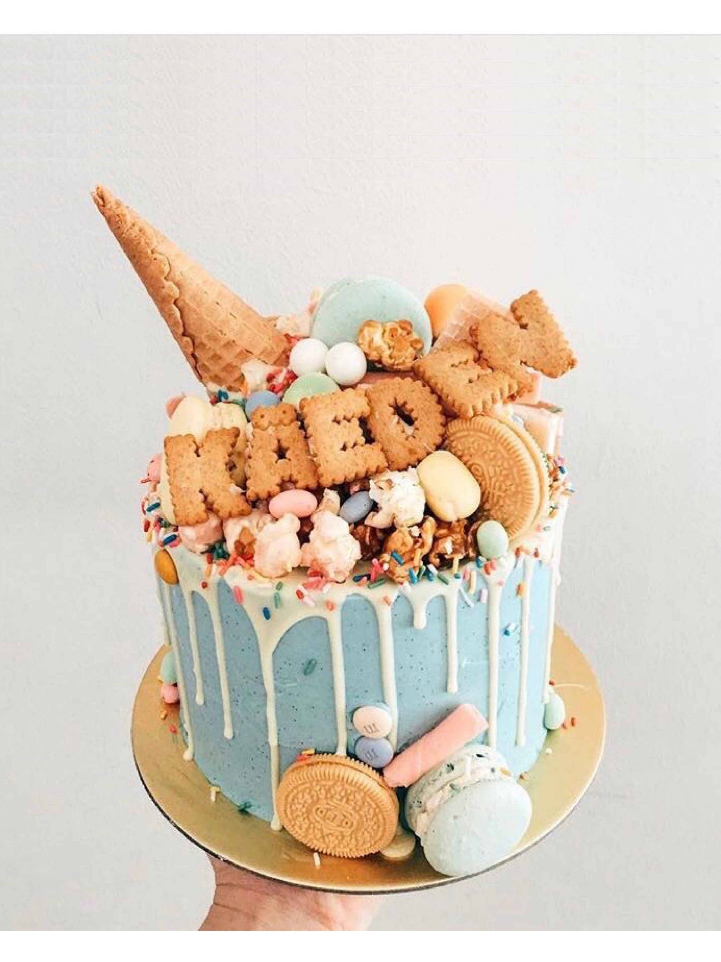 Blue Mad Hatter Drip Cake Singapore | Sarah’s Loft