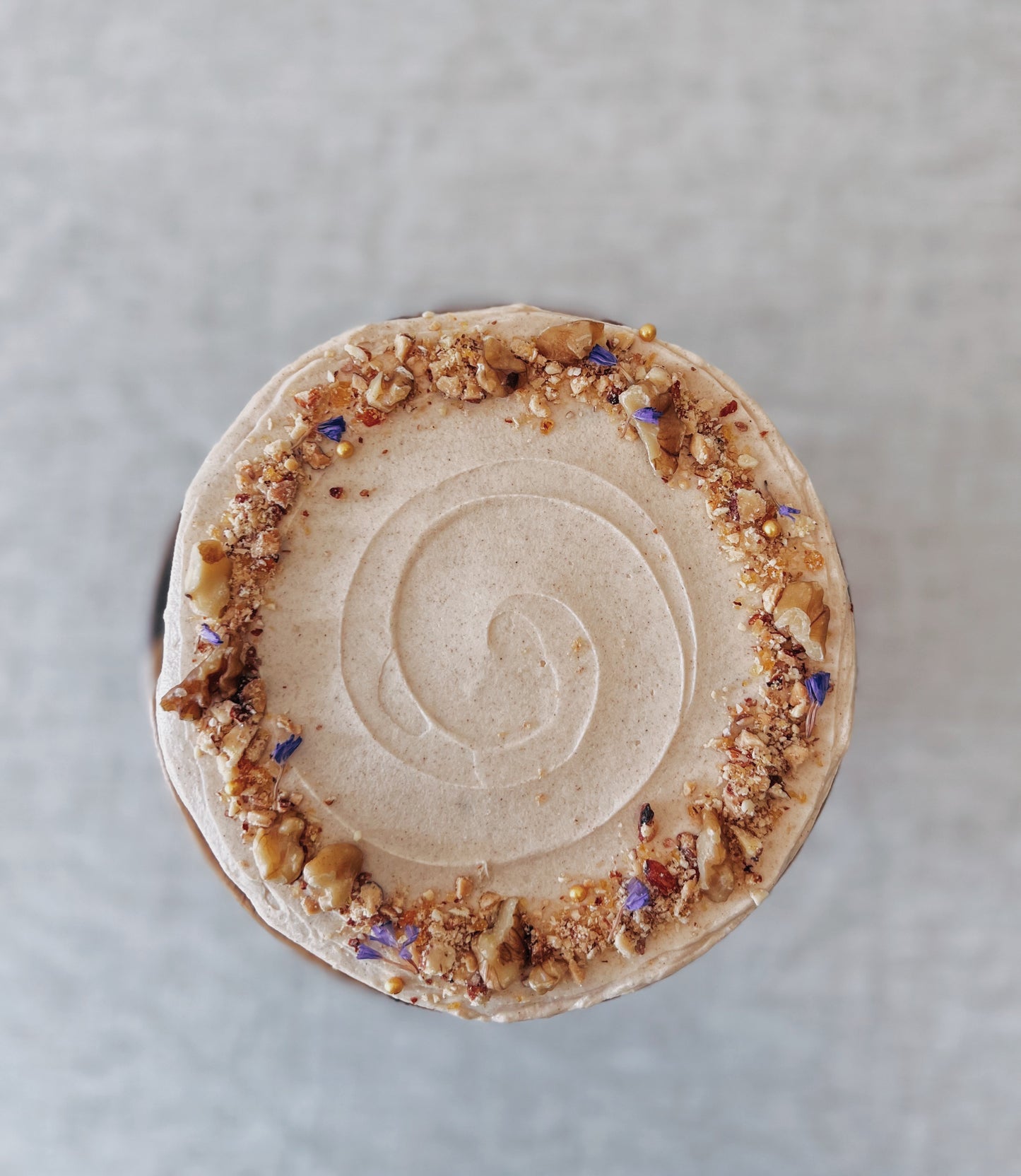 close up of carrot walnut cake frosting texture Singapore