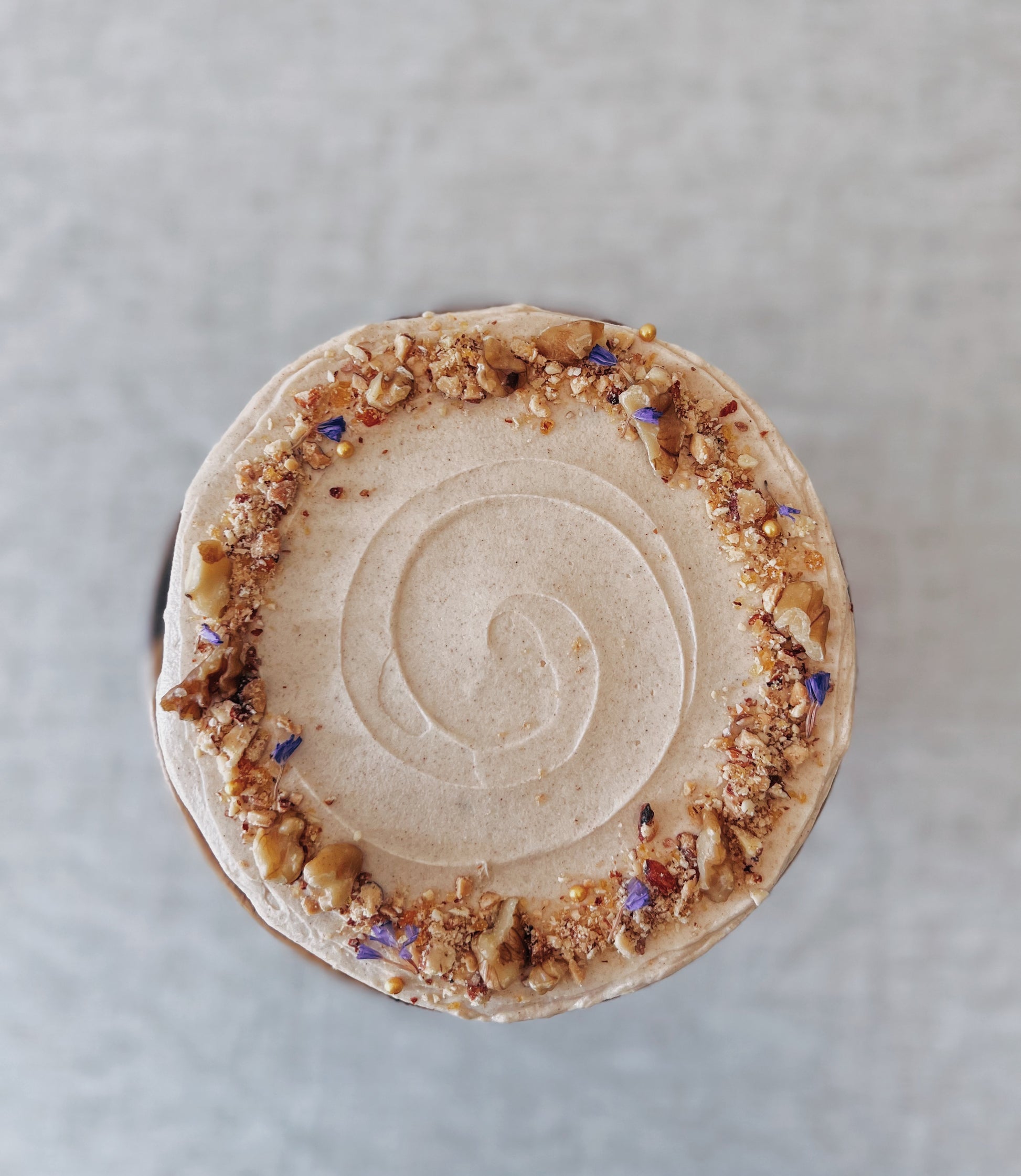 close up of carrot walnut cake frosting texture Singapore
